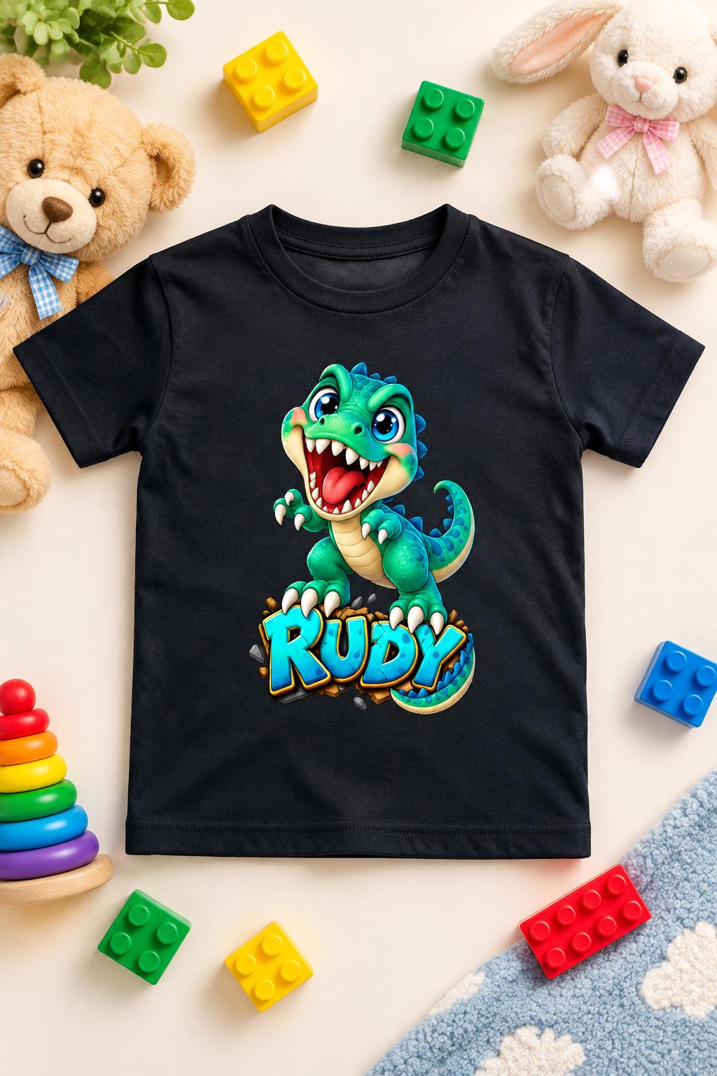 Rudy Dino boys' crew neck T-shirt featuring a cute cartoon dinosaur design.
